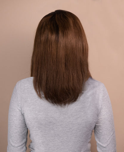 Natural human hair bob wig with a sleek, shoulder-length cut